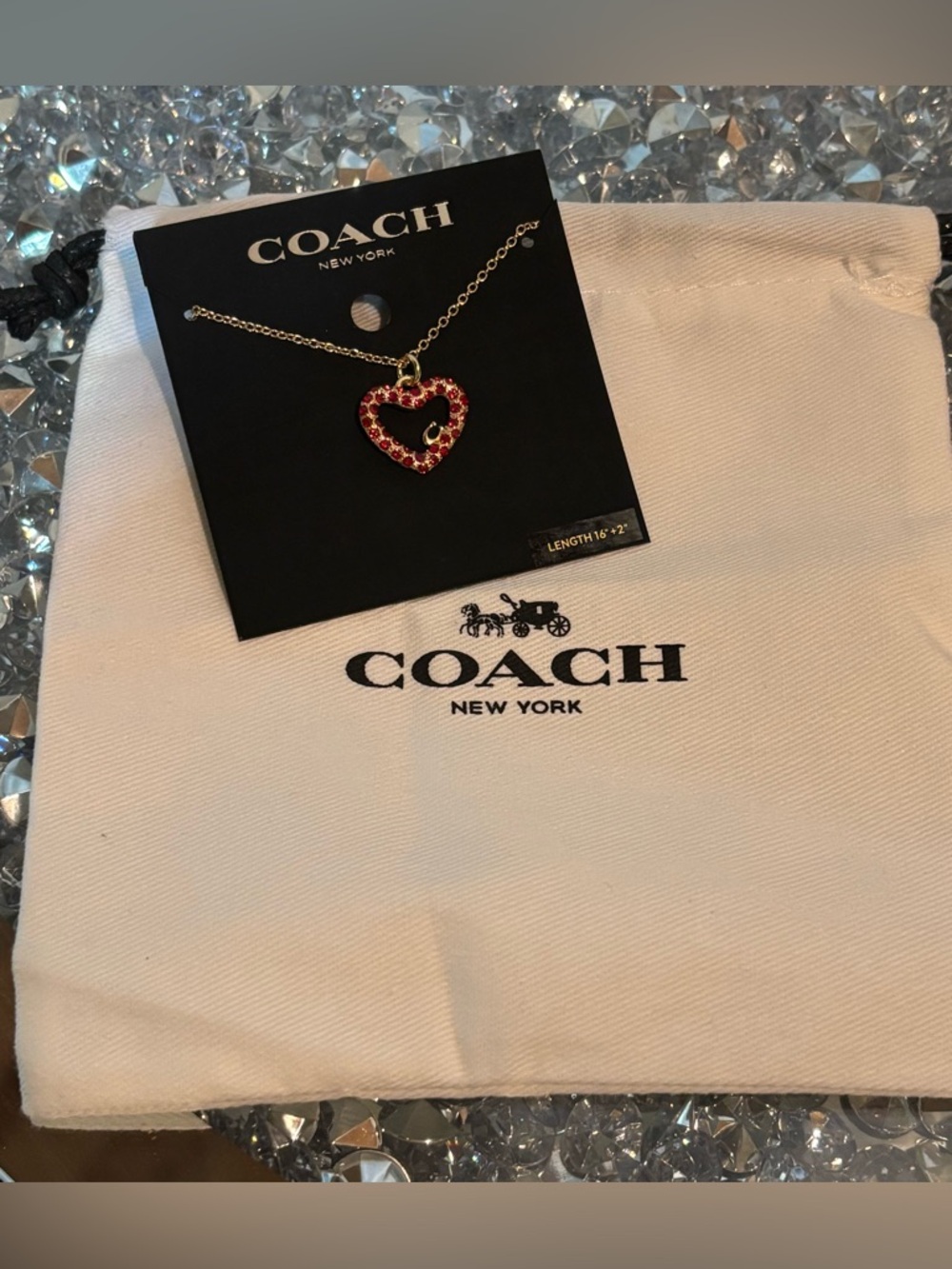 Title:
❤️ Coach Ruby Crystal Open Heart Necklace NWT